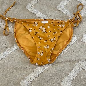 Orange Bikini Bottoms With White Flowers
